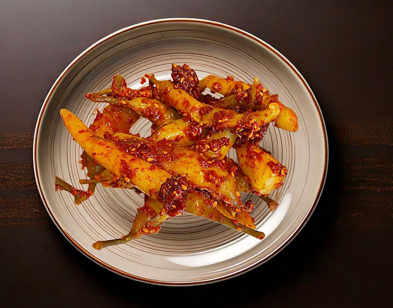 Sakkin Gochu Muchim (Korean Fermented Pickled Chili Salad, 삭힌 고추무침)